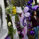 Prince fans beside a sea of purple balloons and flowers at a memorial wall outside the Paisley Park compound of the music legend, who died suddenly at the age of 57, just outside Minneapolis on April 24, 2016.
MARK RALSTON/AFP/Getty Images
